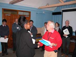 Laurie presenting 2012 students with course certificate Laurie presenting 2012 students with course certificate