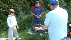 Carlos jnr with Carlos & Jorge cooking Carlos jnr with Carlos & Jorge cooking