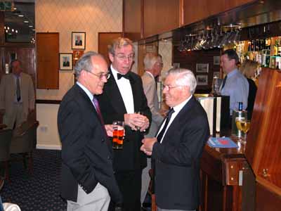 Members and guests talking before the meal