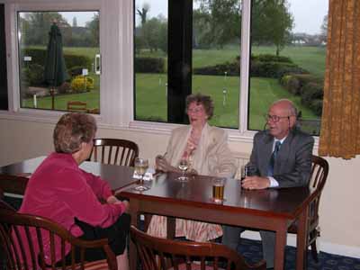 Members and guests talking before the meal