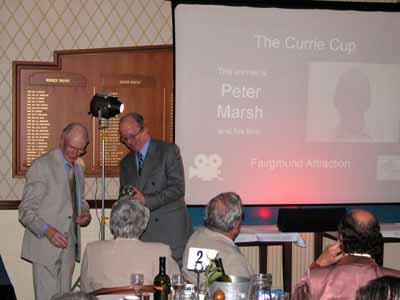 Peter receives the Currie cup from Don